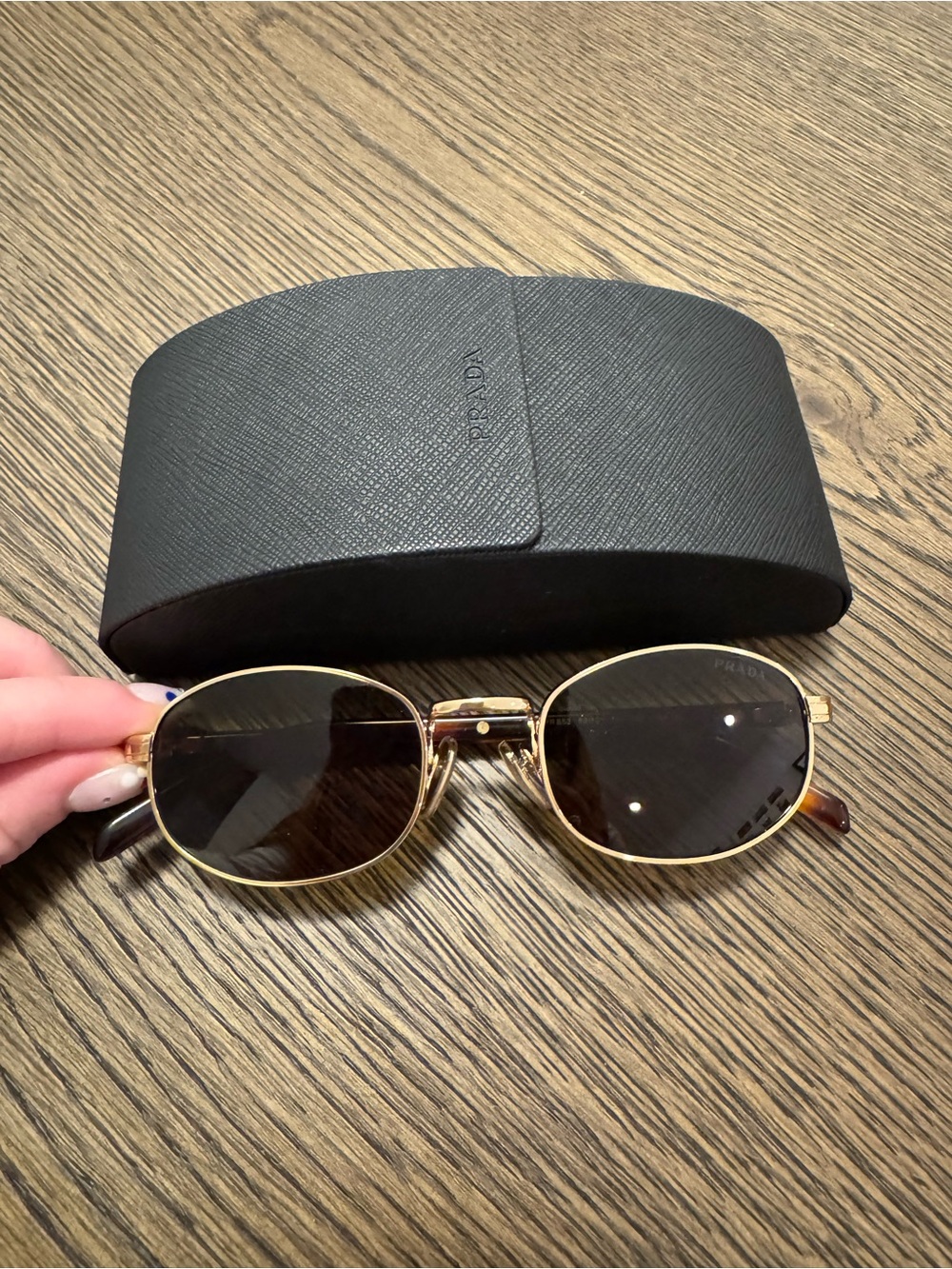 Prada Gold Frame Sunglasses with Black Lenses